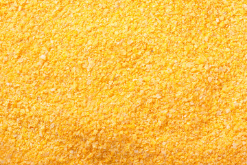 Raw cornmeal flour texture used in polenta on isolated background - obrazy, fototapety, plakaty