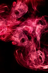Red smoke motion on black background.