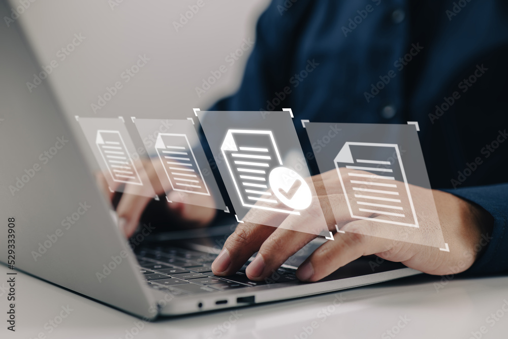 Leinwandbilder laptop with virtual screen and document for paperless quality assurance and erp online approval.