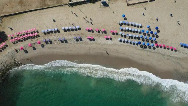 Aerial view picturesque public beach with turquoise water. Los Corales, La Guaira, Venezuela.