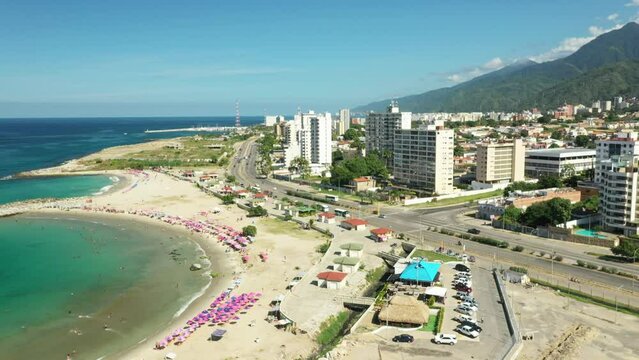 Aerial view picturesque public beach with turquoise water. Los Corales, La Guaira, Venezuela.