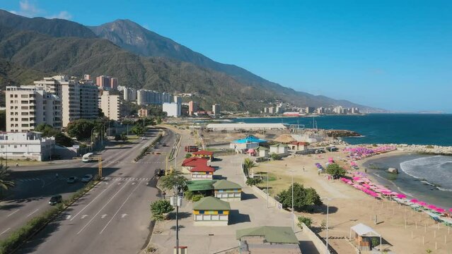 Aerial view picturesque public beach with turquoise water. Los Corales, La Guaira, Venezuela.