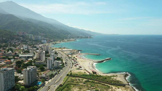 Aerial view picturesque public beach with turquoise water. Los Corales, La Guaira, Venezuela.