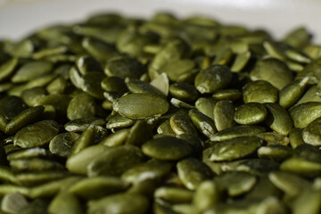 Pile of shelled green pumpkin seeds