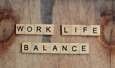 work life balance text on wooden square, motivation and inspiration quotes
