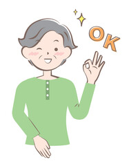 OKサインを出す私服の高齢の女性