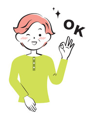 OKサインを出す私服の高齢の女性　3c