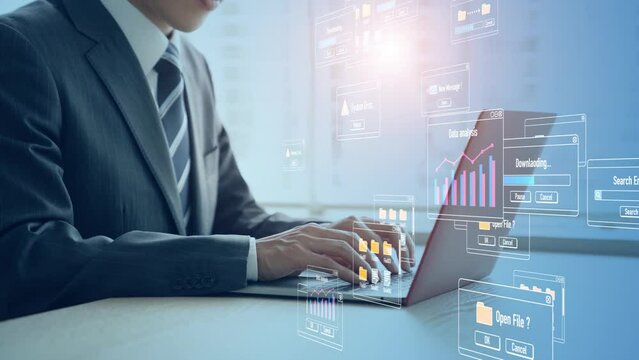 ノートパソコンを使うエンジニアとダイアログボックス 