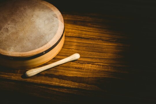 High angle view of bodhran with stick