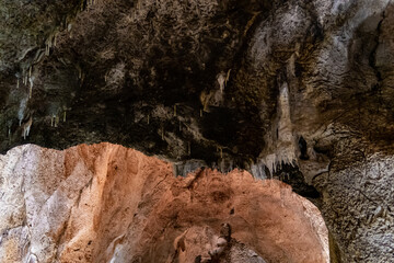A cave  with stalagmites and stalactites in which a caveman lived in a national reserve - Nahal Mearot Nature Preserve, near Haifa, in northern Israel