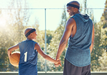 Basketball, family and sport with a dad and son training on a court outside for fitness and fun....