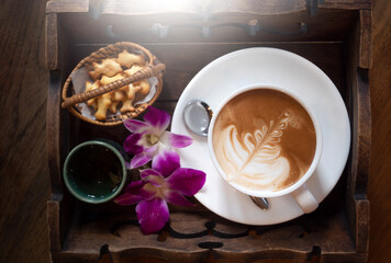 Latte Art Hot coffee in nature background.