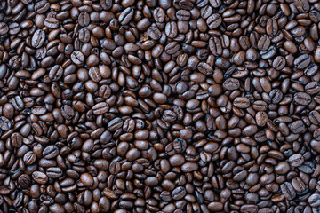 Background of fresh roasted coffee beans, close up, top view