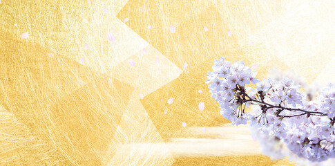 舞い散る桜の花びら　金色の和紙の背景