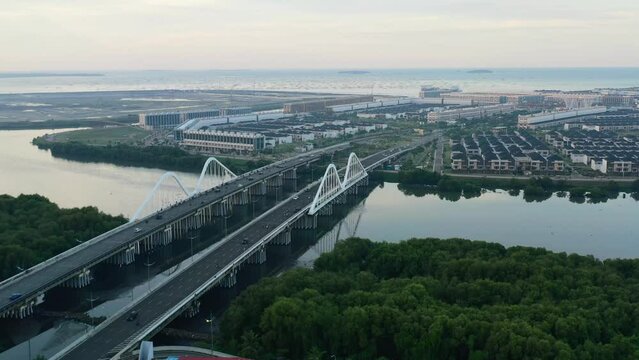 aerial view of the PIK riverfront residential developments in Jakarta at sunset