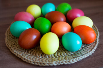 Fototapeta na wymiar Close-up easter colorful eggs on napkin.