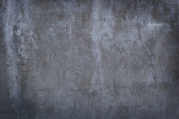 Obraz na płótnie Canvas Texture of concrete with small cracks and vignetting.