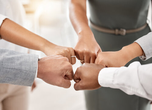 Diversity, business team and fist bump in office with support, team building and employee teamwork. About us, partnership and hands in circle with trust, mission and goals at work.