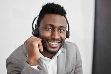 Call center, black man and contact us worker in crm customer service, consulting and sales telemarketing office. Happy smile portrait of businessman, receptionist or communication employee