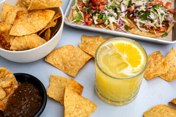 Yellow margarita cocktail with mexican food