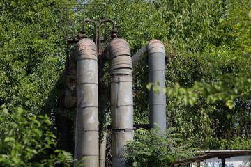 Details with old and rusty pipelines at a Romanian abandoned power plant.