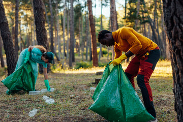 Volunteers cleaning park from plastic