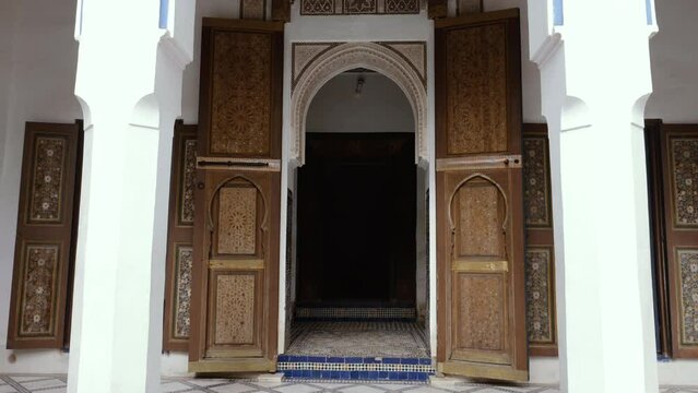 Moroccan, wooden door, with traditional wood carvings. Moroccan Islamic, Moorish architecture design. 4k footage.