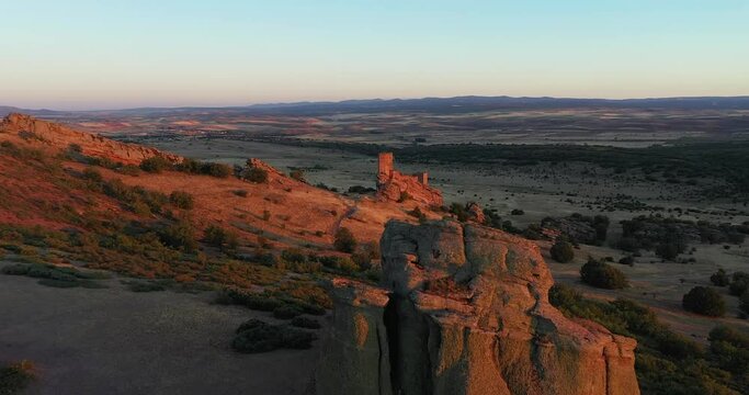 Revealing Shot Of Iconic Game Of Thrones Season 6 Filming Location, Castle Of Zafra At Dusk In Guadalajara, Spain. aerial