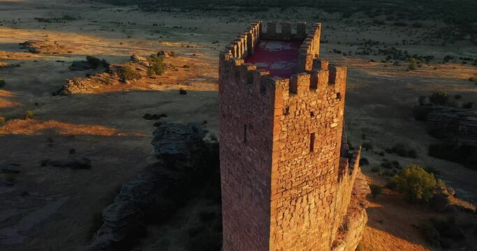 Castle Of Zafra At Sunset In Guadalajara, Spain. Game Of Thrones Film Location. aerial orbit