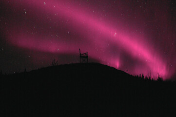 pink aurora over the mountain - obrazy, fototapety, plakaty