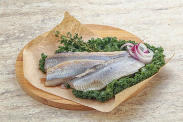 Marinated Herring fillet with onion
