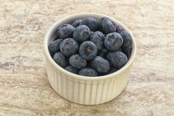 Sweet ripe blueberry heap in the bowl