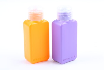 the bottle yellow and violet color packaging isolated on white background