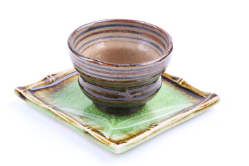 Asian ceramics tea cups on white background