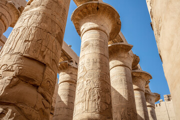Different hieroglyphs on the walls and columns in the Karnak temple. Karnak temple is the largest...