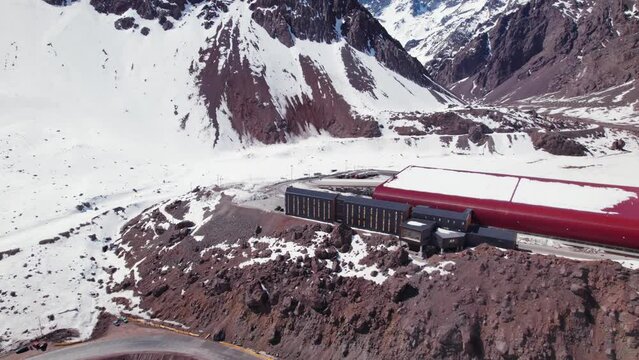 Fly Away At Los Libertadores Pass Chilean Customs Office In The Andes Mountains. Aerial Pullback Shot