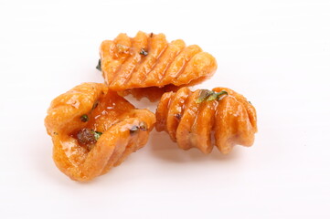 thai dessert called krong-krang-krob or crispy pastry isolated on white background