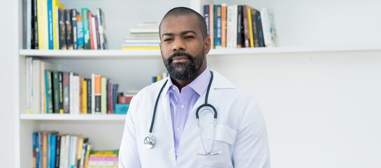 Mature adult african american doctor with beard and stethoscope
