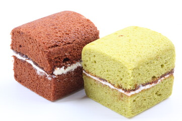 Brownie cheese cake and green tea cake on white background