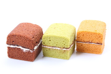 Brownie cheese cake and green tea cake on white background