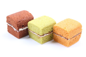 Brownie cheese cake and green tea cake on white background
