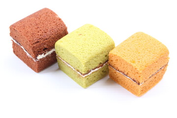 Brownie cheese cake and green tea cake on white background