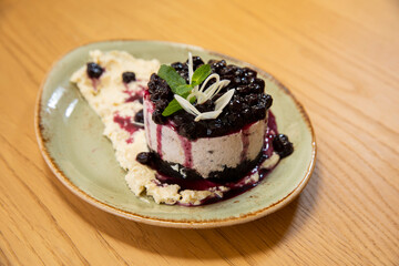Vanilla ice cream with blueberries jam