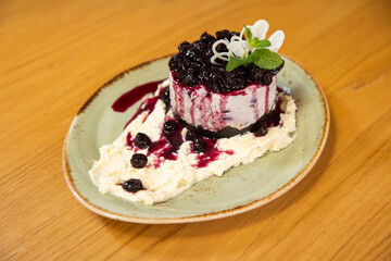 Vanilla ice cream with blueberries jam