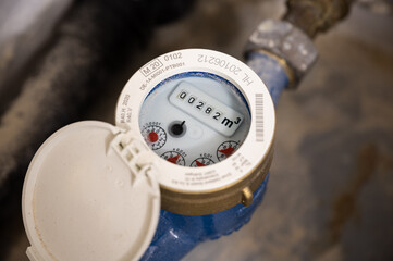 Analog water meter measures water consumption in cubic meters