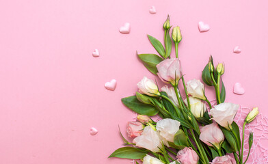 Festive bouquet of flowers for the beloved on a pink background. The concept of love congratulations on the wedding, March 8, Valentine's Day, Christmas and birthday. Copy space. - obrazy, fototapety, plakaty