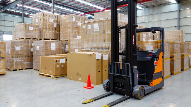 Forklift parked inside the warehouse.