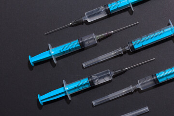 Disposable plastic syringe prepared for injection and vaccination in the hospital. The concept of medicine and health