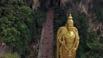 Aerial view of the entrance to the popular Batu Caves near Kuala Lumpur, Malaysia, one of the most important Hindu shrines outside of India, dedicated to Lord Murugan.