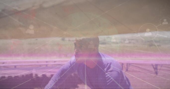 Animation of network of profile icons over african american fit man climbing at obstacle course